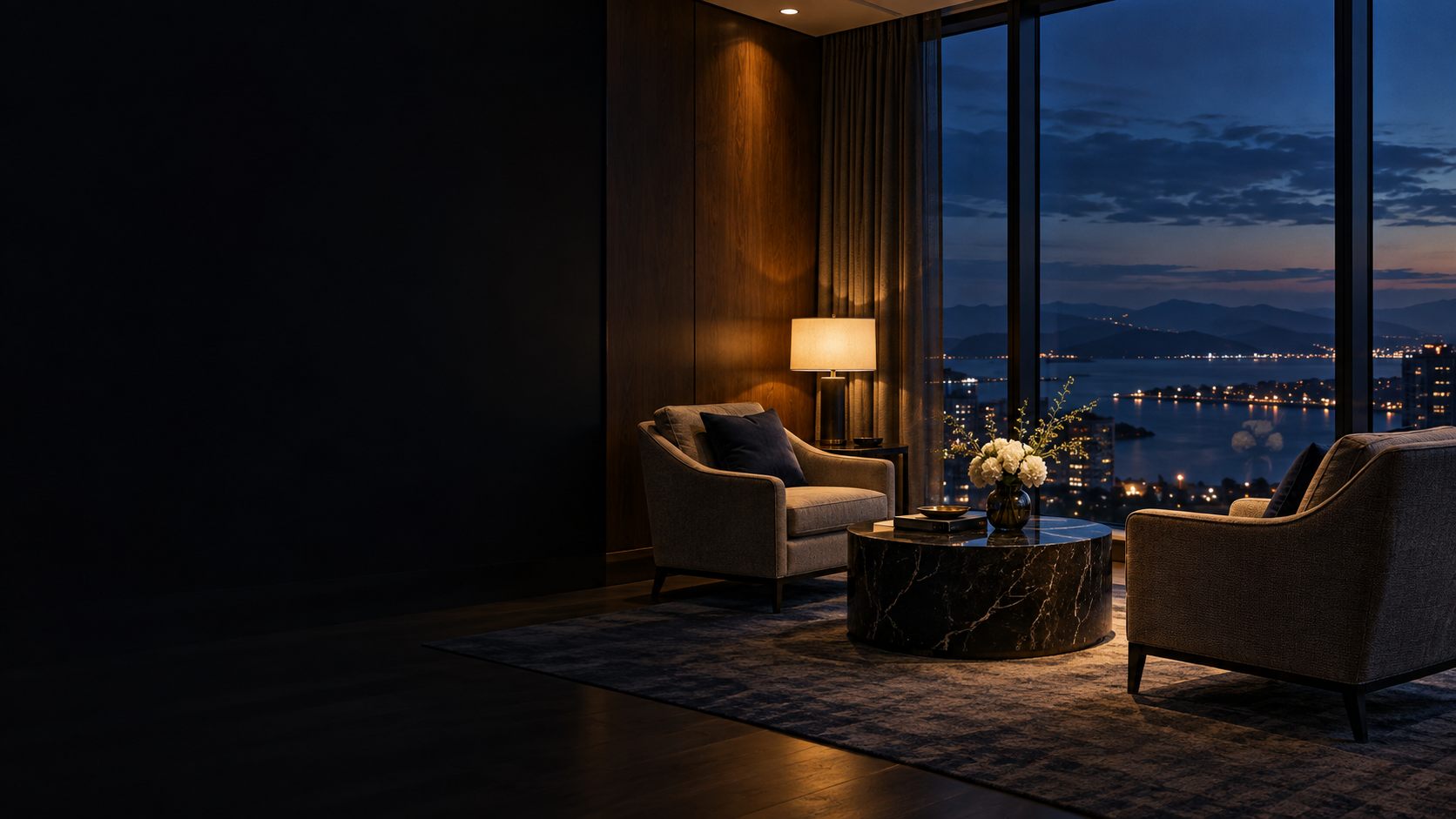 Private meeting room at dusk overlooking a coastline